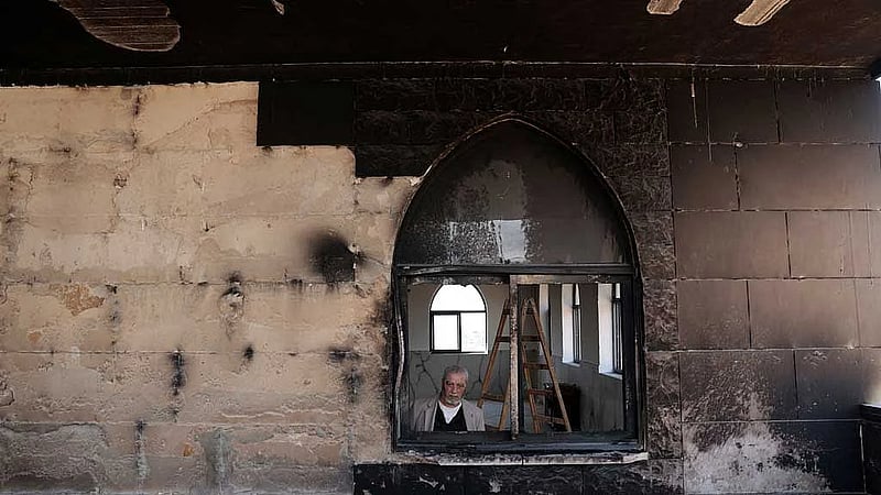 Israeli settlers set fire to West Bank mosques after deadly clash