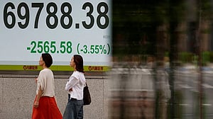 Asian stocks wobble after tech-led selloff, volatility risk highlighted