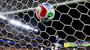 How many points are needed to advance to the World Cup knockouts?