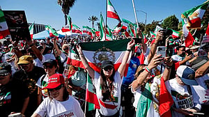 Some Iranian Americans wave protest flags, others cheer as Iran play World Cup opener