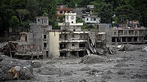 Nepal must rebuild thousands of homes, no let up in search for missing