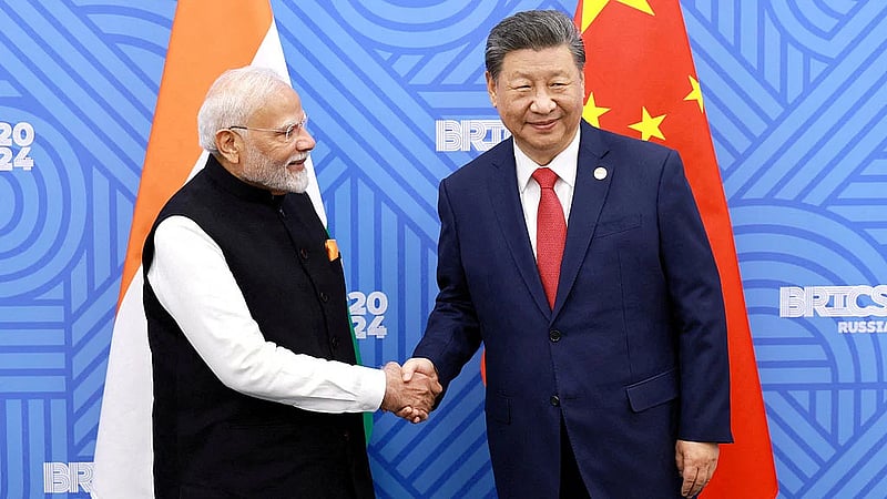 India's Modi and China's Xi push business links, border peace as ties revive