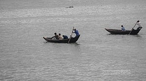 Buriganga turns blue in rainwater