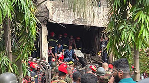 1 dead as Bangladesh Air Force plane crashes into school building in Dhaka