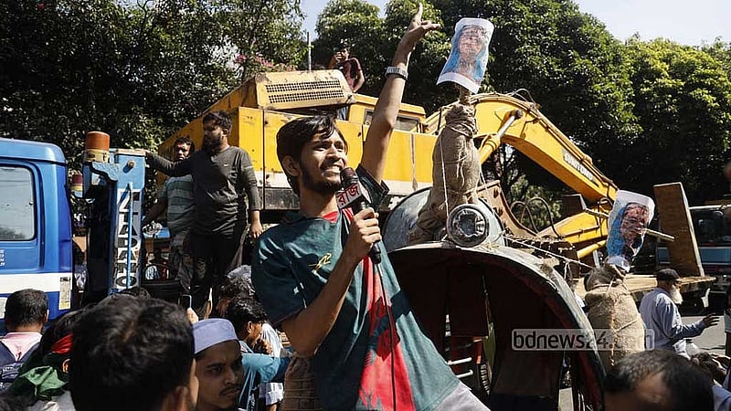 Vandals flee Dhanmondi 32 amid baton strikes, stun grenades; excavator driver bolts