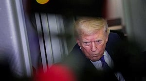 Trump signs order threatening tariffs on nations doing business with Iran