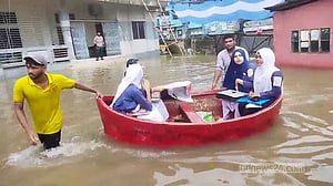 HSC examinees use boats to reach centres as 3-hour downpour waterlogs Cumilla