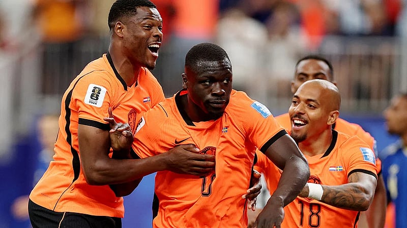 Netherlands gun for top spot against hapless Tunisia