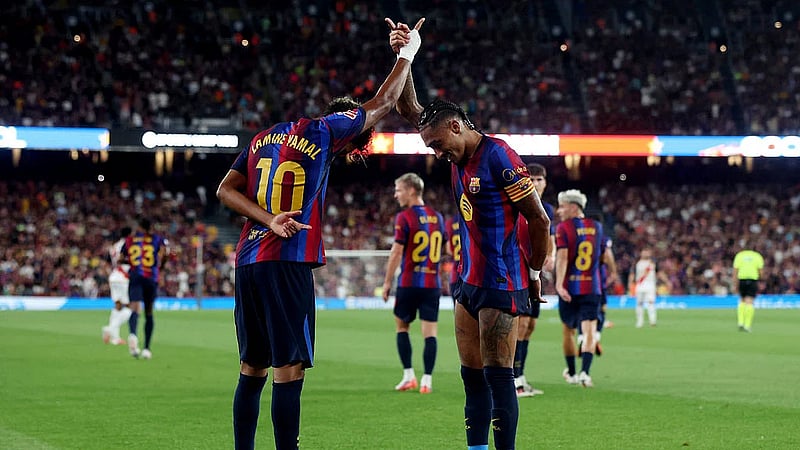 Raphinha and Lamine doubles lift Barcelona past Rayo Vallecano