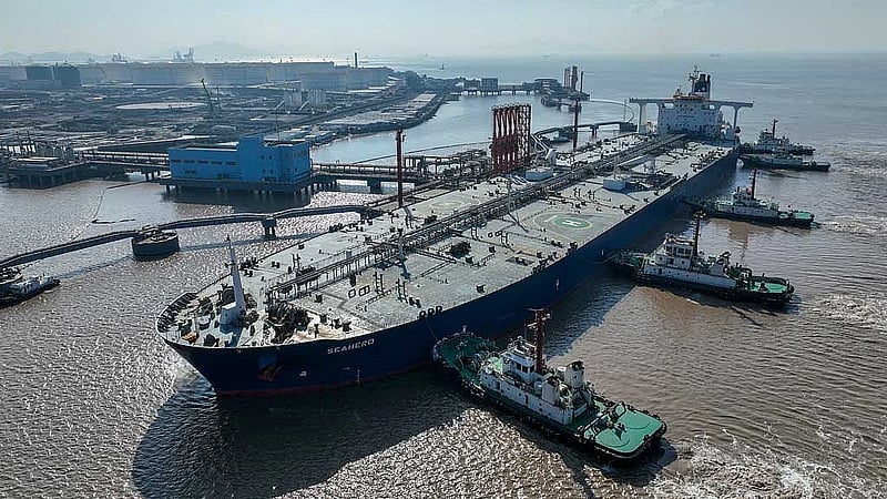Oil steady, traders hopeful on China demand but worried about Fed