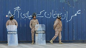 Pakistan's ex-spy chief jailed for 14 years in rare military rebuke