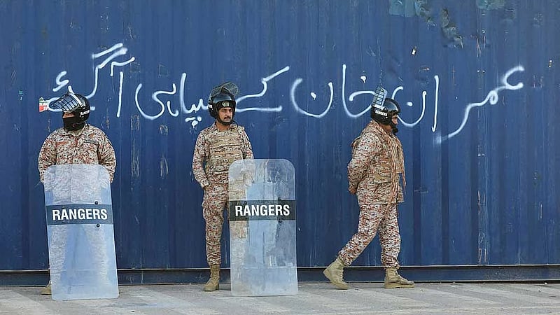 Pakistan's ex-spy chief jailed for 14 years in rare military rebuke