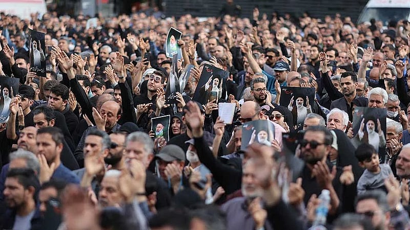In divided Iran, president's death met by muted mourning and furtive celebration