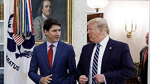 Trump, Trudeau set to speak on Wednesday amid tariff battle, source says