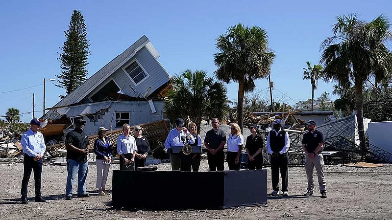 Biden tours Florida's storm-hit streets as Milton debris piles up