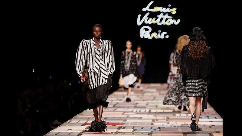 Louis Vuitton shows flouncy, layered looks at the Louvre for Paris Fashion Week