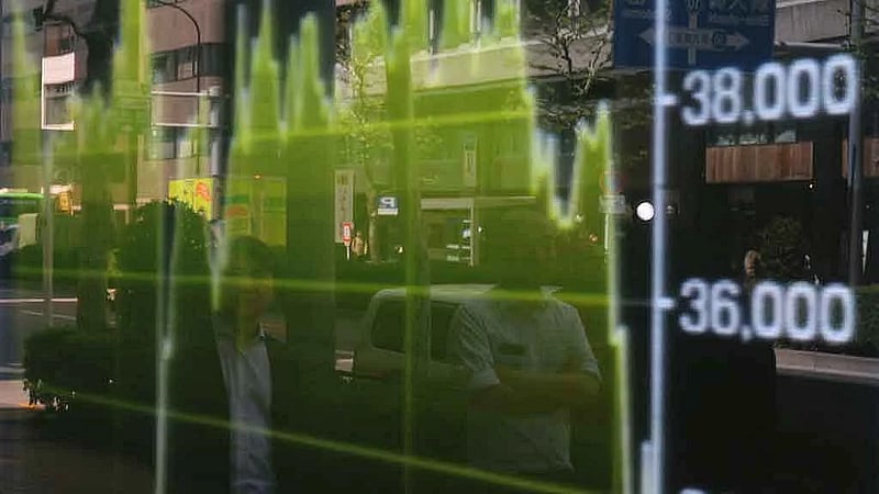 Shares fall in Asia as Nvidia curbs fan worries, gold hits record