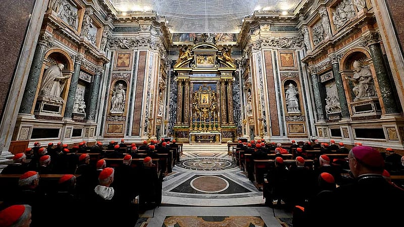 What is a Roman Catholic conclave and who takes part?
