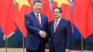 China, Vietnam sign deals as Xi visits Hanoi amid US tariff tensions