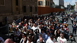 Tens of thousands line up to pay final respects to Pope Francis at the Vatican