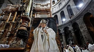 Christians gather at Jerusalem's Holy Sepulchre to mourn Pope Francis