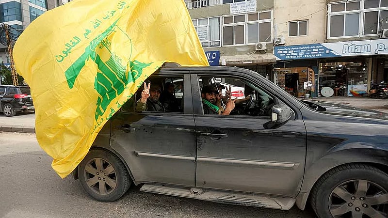 Facing calls to disarm, Hezbollah ready to discuss weapons if Israel withdraws, senior official says