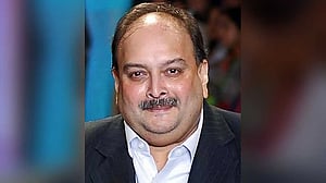 Indian fugitive accused in nearly $2bn bank fraud arrested in Belgium, source says