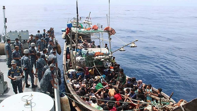 Bangladesh Navy detains fishing trawler with 214 displaced Myanmar nationals attempting to cross into Malaysia