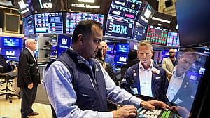 Indexes drop as Fed's Powell says growth appears to be slowing; Nvidia tumbles
