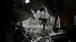 Hamas open to long Gaza truce but not to disarming, an official says