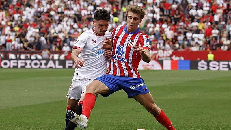 Atletico back to winning ways with last-gasp 2-1 victory at Sevilla
