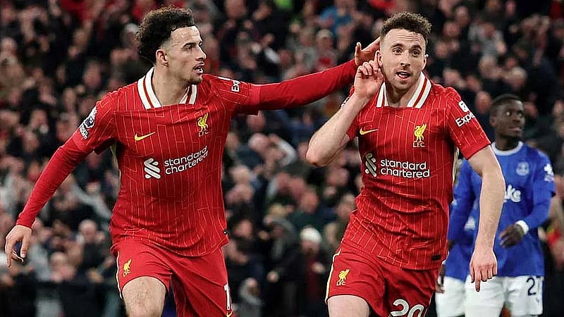 Liverpool restore 12-point lead as Jota seals win over Everton