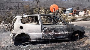 Wildfires kill three across southern Europe, force thousands to evacuate