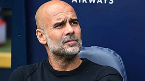 Man City's Guardiola backs keeper Trafford after Spurs error