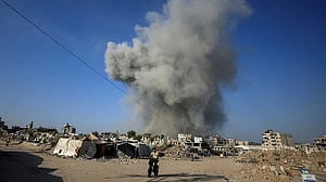 Israel pounds Gaza City suburbs, vows to press on with offensive