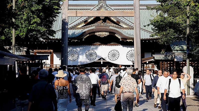 Japan minister joins crowds at controversial shrine to mark 80 years since World War Two defeat