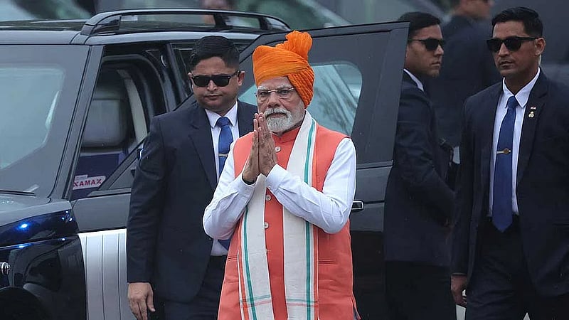 Modi's tax overhaul to strain finances but boost image amid US trade tensions