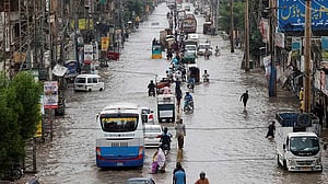 Two Pakistan towns face flood risk if river barrage crumbles, officials say
