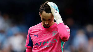 Guardiola defends Trafford after costly error against Spurs