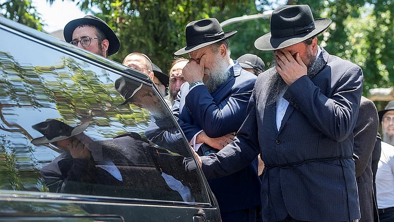 Alleged Bondi gunman charged with 15 murders as funerals of victims begin