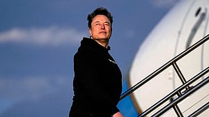Elon Musk becomes first person worth $700bn following pay package ruling
