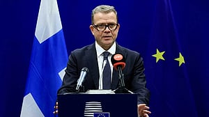 Finland's prime minister apologises to Asian nations over racism scandal
