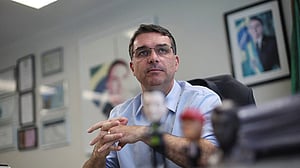 Jair Bolsonaro backs son's Brazil presidential bid, undergoes hernia surgery