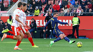 In-form Atletico ease to 3-0 victory at lowly Girona