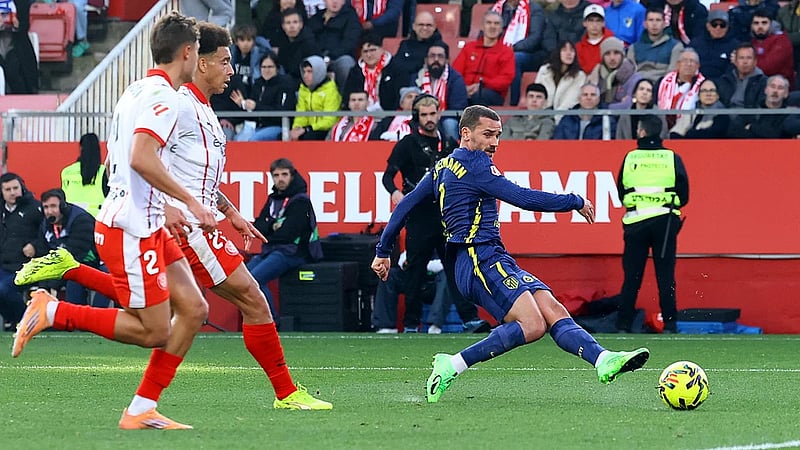 In-form Atletico ease to 3-0 victory at lowly Girona