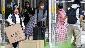 Hong Kong apartment fire toll hits 159, infant among dead