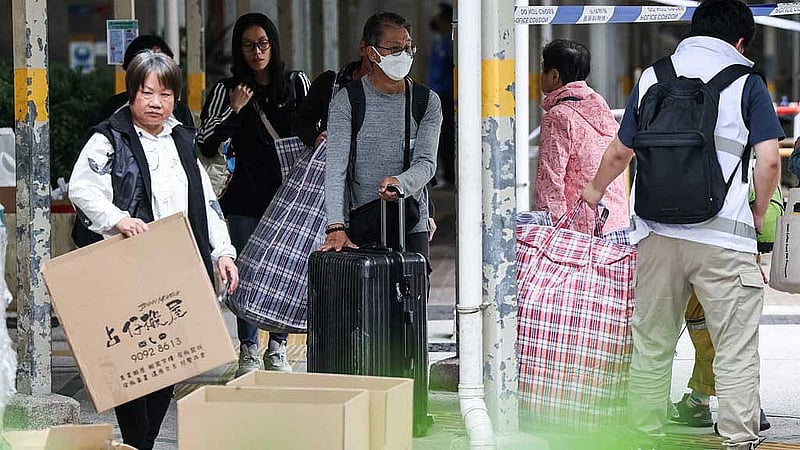 Hong Kong apartment fire toll hits 159, infant among dead