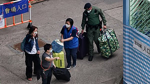A week after Hong Kong's deadly fire, some residents return for belongings