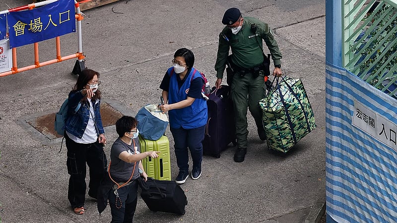 A week after Hong Kong's deadly fire, some residents return for belongings