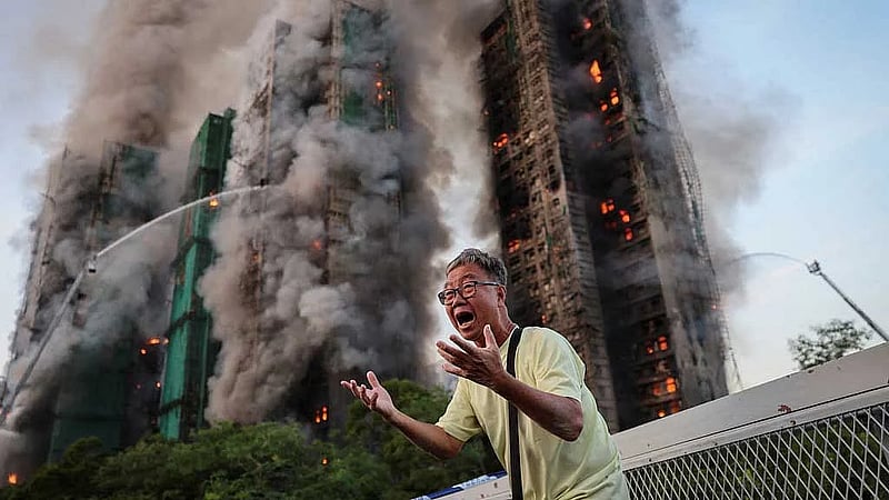 The photo that became a symbol for Hong Kong's deadly fire